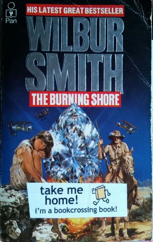 The Burning Shore Wilbur Smith `Centaine screamed and drove the point of her stave down into the jaws with all her strength. She felt the sharpened end bite into the soft pink mucous membrane in the back of its throat, saw the spurt of scarlet blood, and