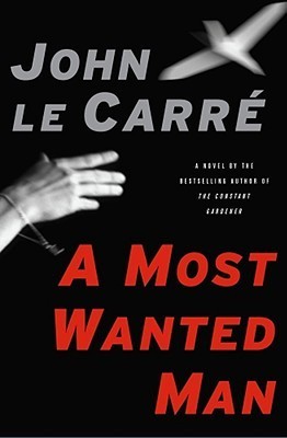 A Most Wanted Man John Le Carre"A half-starved young Russian man in a long black overcoat is smuggled into Hamburg at dead of night. He has an improbable amount of cash secreted in a purse around his neck. He is a devout Muslim. Or is he? He says his name